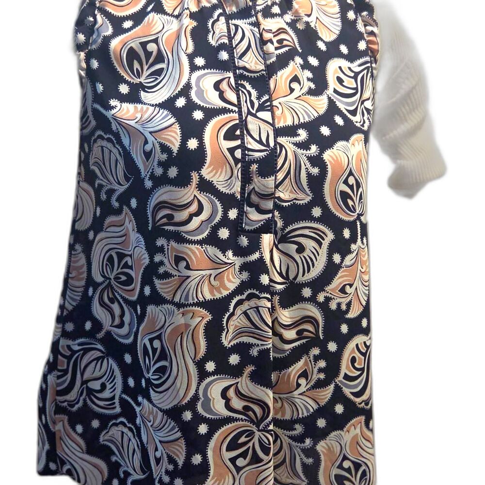paisley sleeveless top with ruffle mock neck